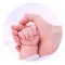 newborn-baby-hand-gently-held-by-a-parent-hand